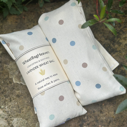Long cotton wheat bag, lavender scented neck wrap. Hottie heat pad dotty print.