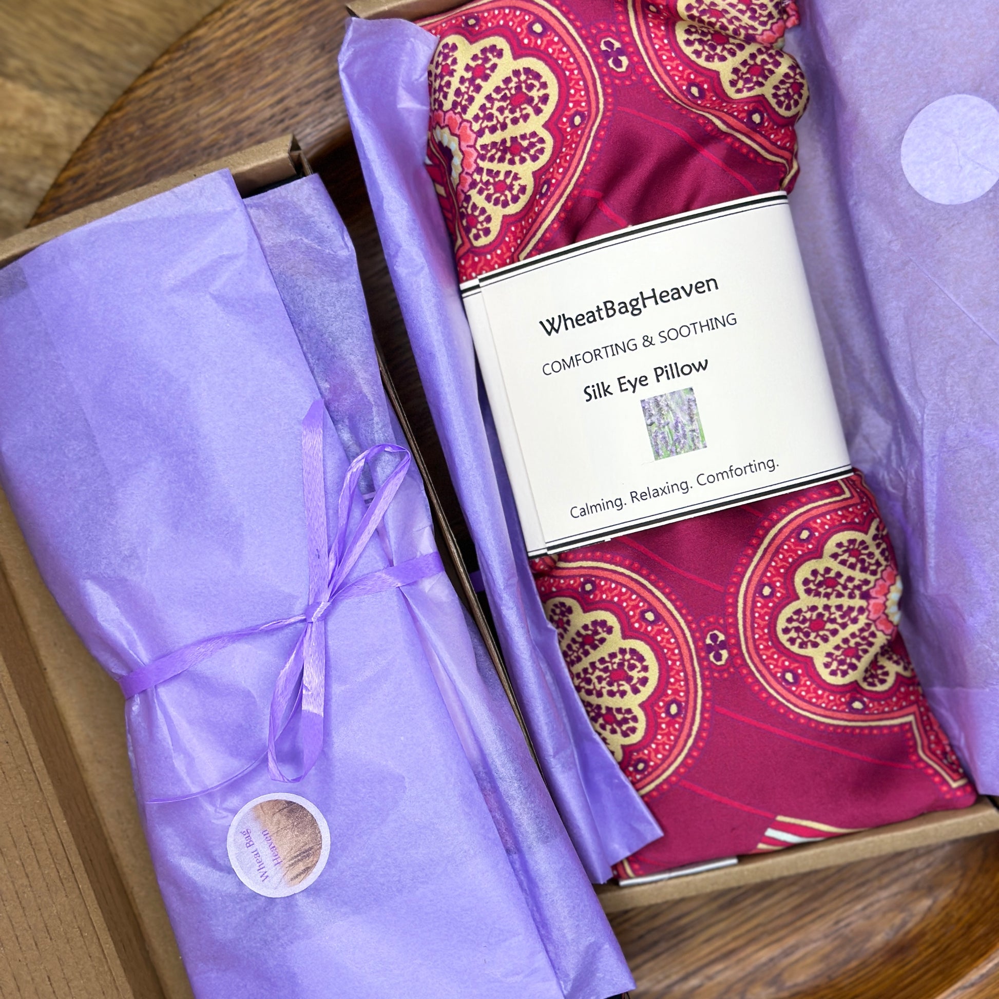yoga meditation silk eye pillow from WheatBagHeaven. Wrapped in lilac tissue and tied with ribbon