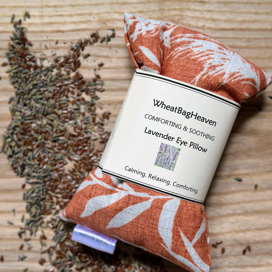 Orange eye pillow for yoga meditation in a grass print from WheatBagHeaven