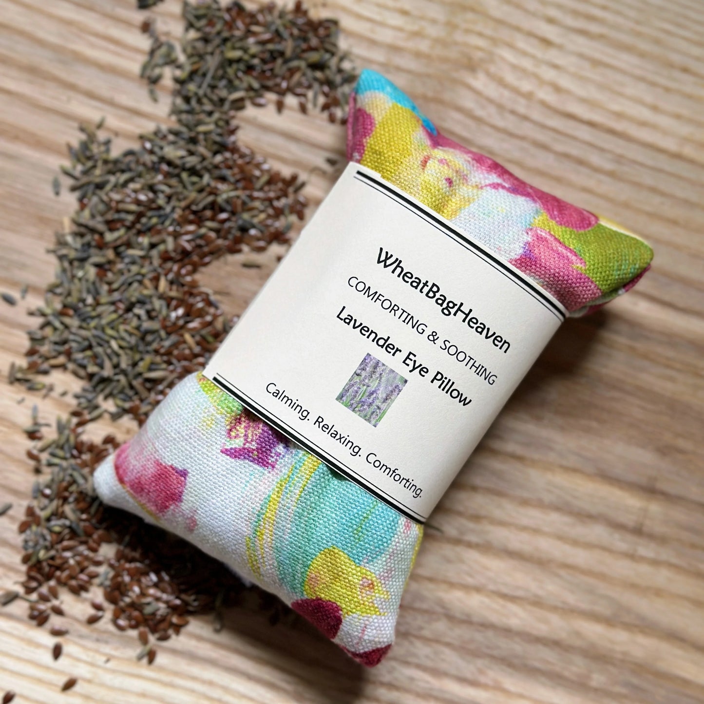 eye pillow with lavender and flax seed in a bright colourful abstract print size 20x9cm and ready to post
