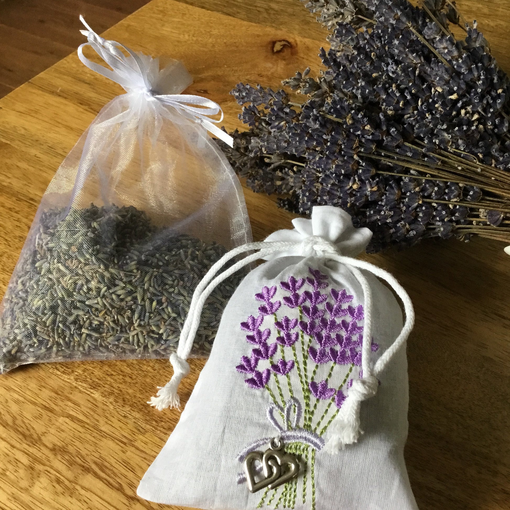 Embroidered Lavender bag plus dried lavender for inside the bag.