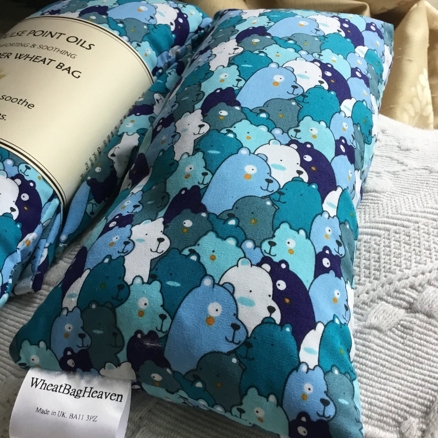 Long cotton wheat bags for children in a multi blue bear print