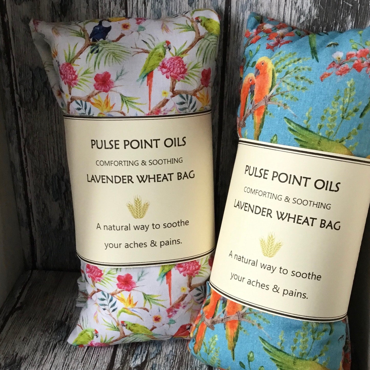 long cotton wheat bags, heat neck wrap in parrot and toucan printed cotton fabric for holistic wellness