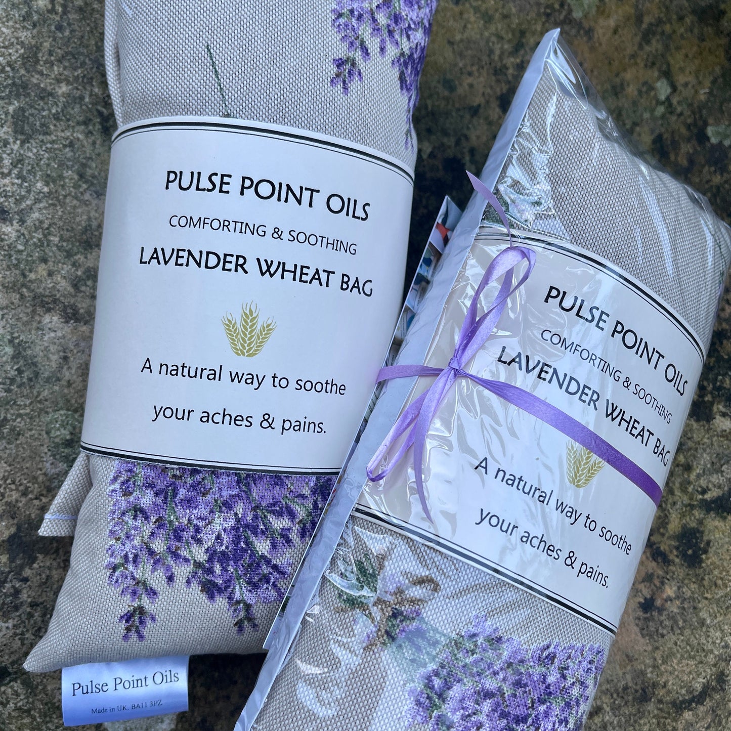 Two lavender lover wheat bags, printed and filled with lavender for therapeutic wellness and wellbeing from wheatbagheaven.com