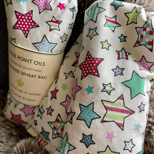 Children's wheat bag, heatable body wrap in a cotton candy star fabric, a lovely get well soon gift