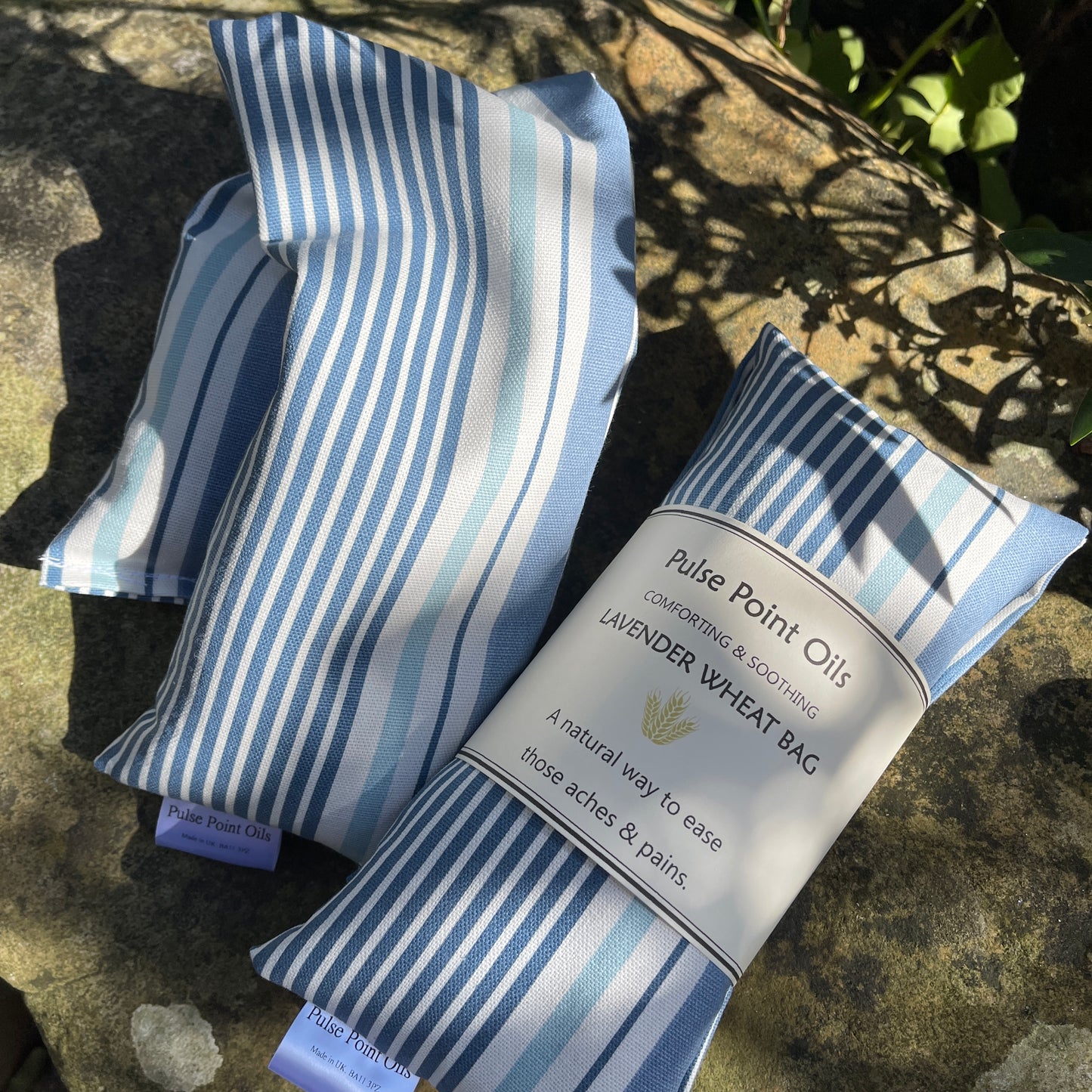 Scented wheat bag, lavender denim blue stripe hottie heating pad, body warmer for wellness and relaxation.