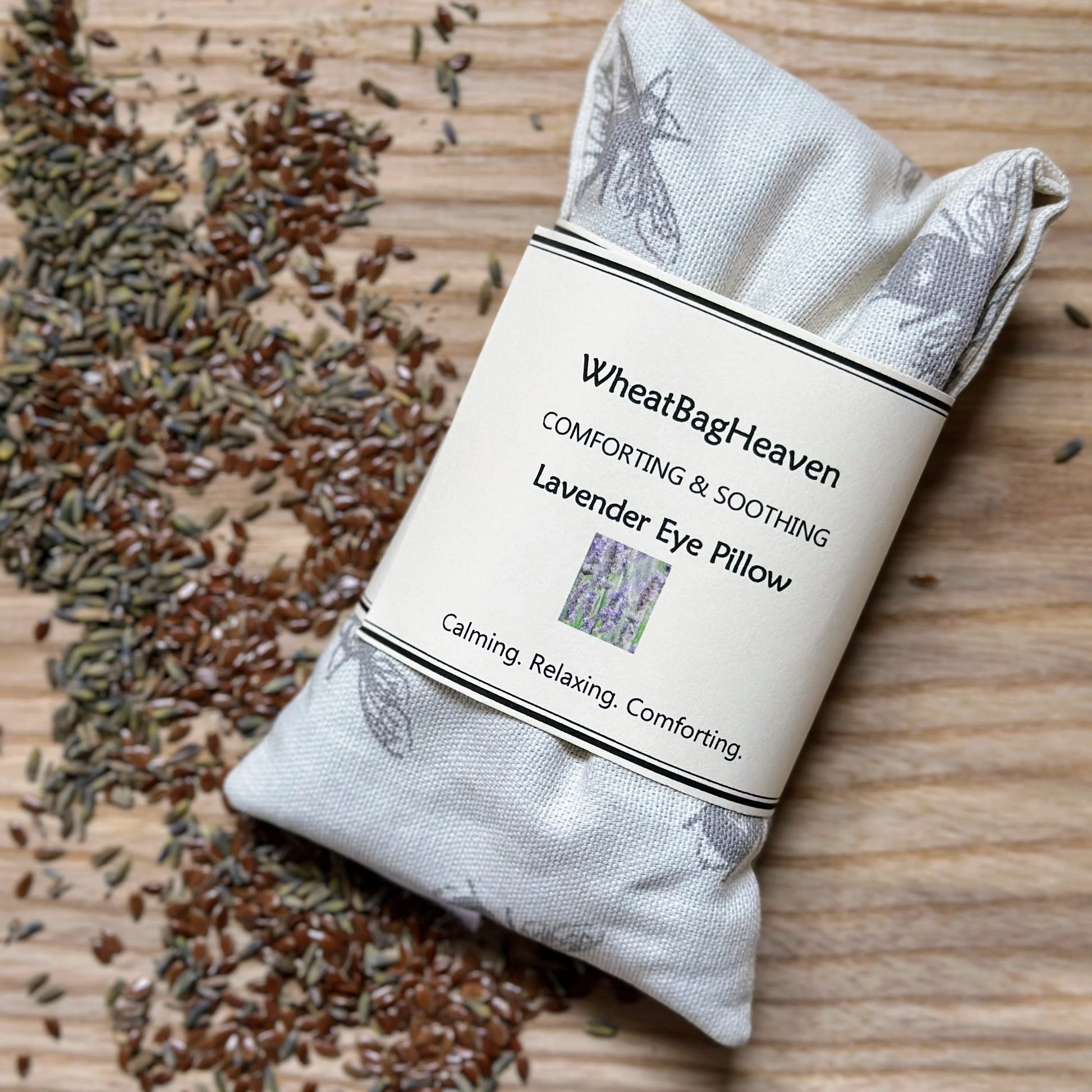 Lavender scented eye pillow in a cream bee printed cotton fabric with flaxseed and dried lavender filling to soothe dry tired eyes