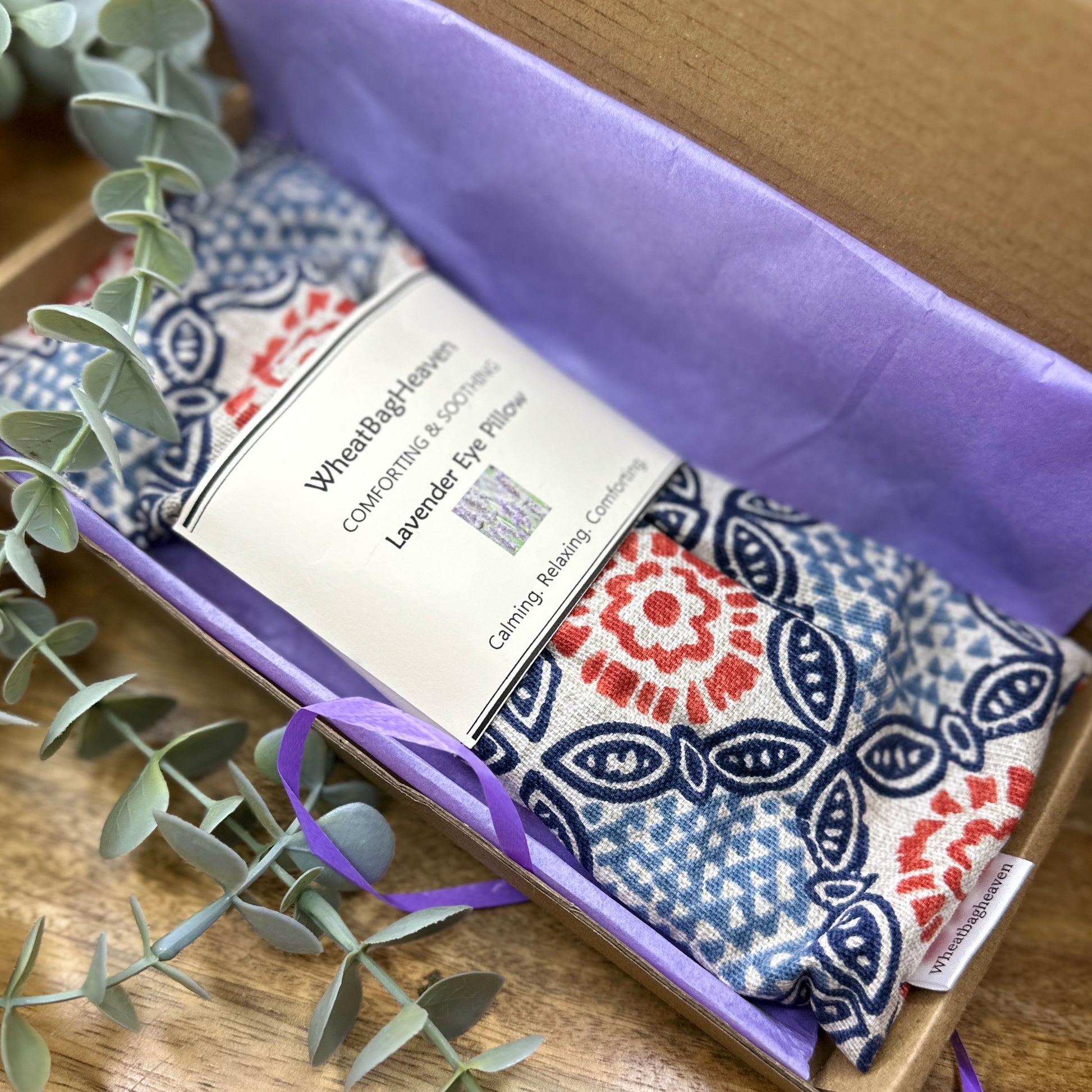 sleep mask eye pillow filled with flaxseed and English lavender aiding relaxation. Mandela cotton print wellbeing letterbox gift