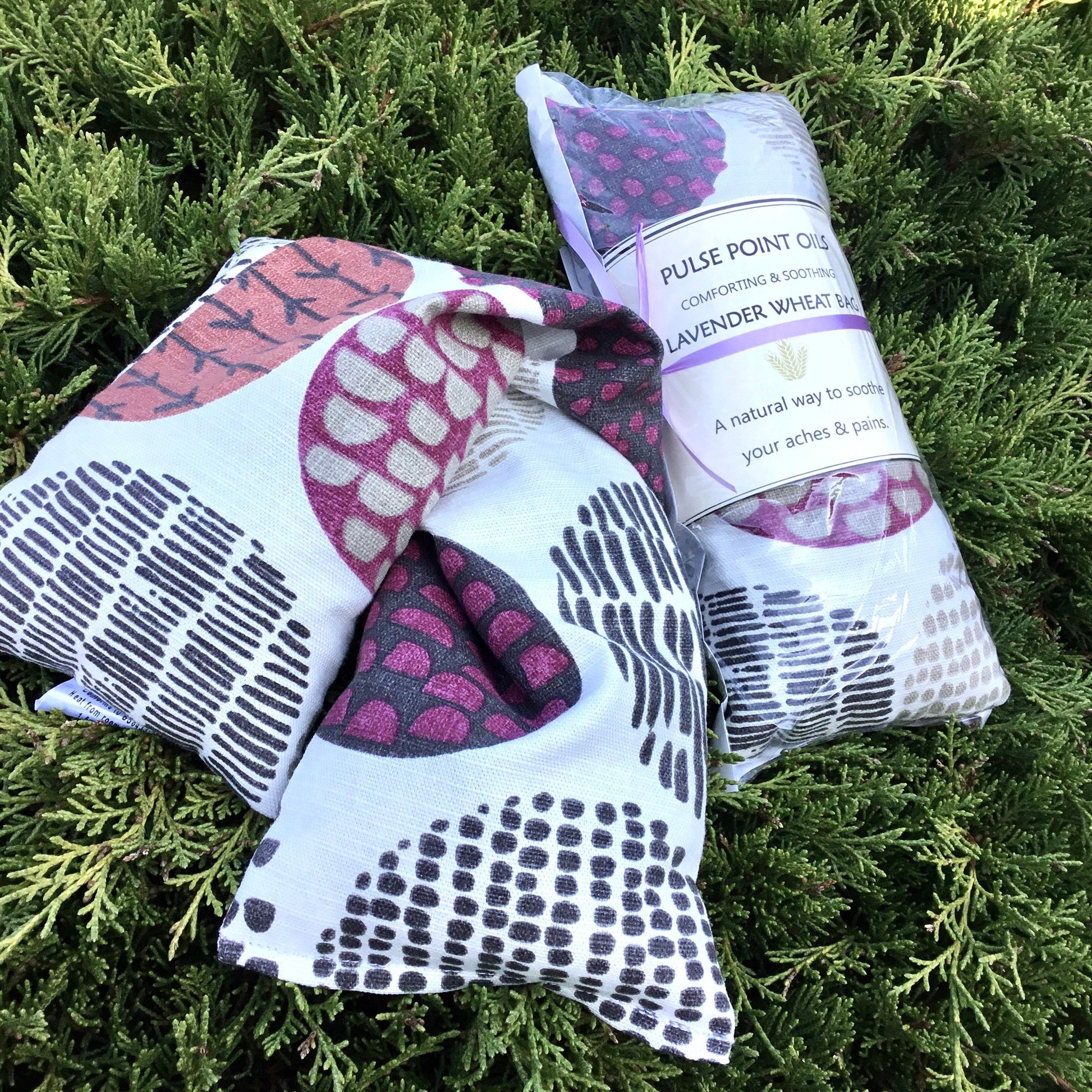 pink and purple long neck wrap heating pad. Lavender scented wheat bag 