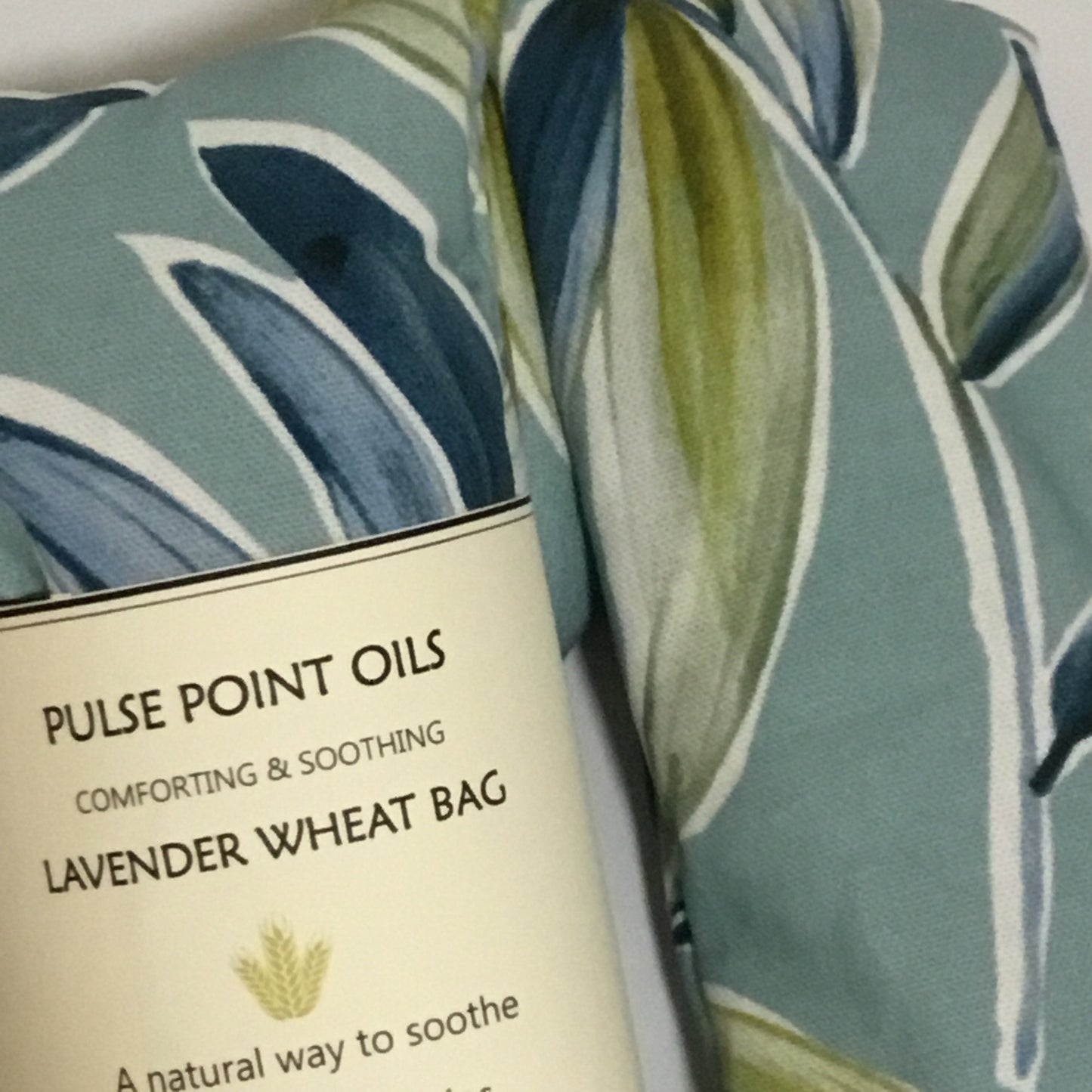 Close up of Microwave lavender scented wheat bag. Ventura palm print.