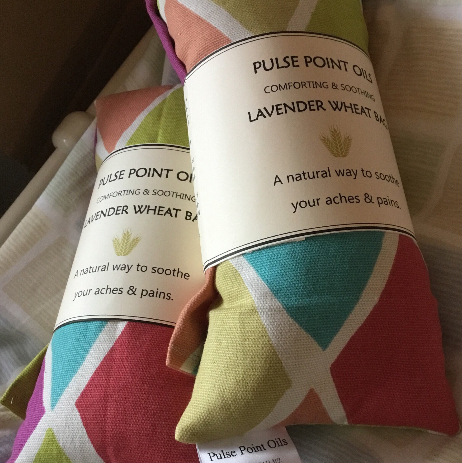 two red, blue and green lavender scented long wheat bag