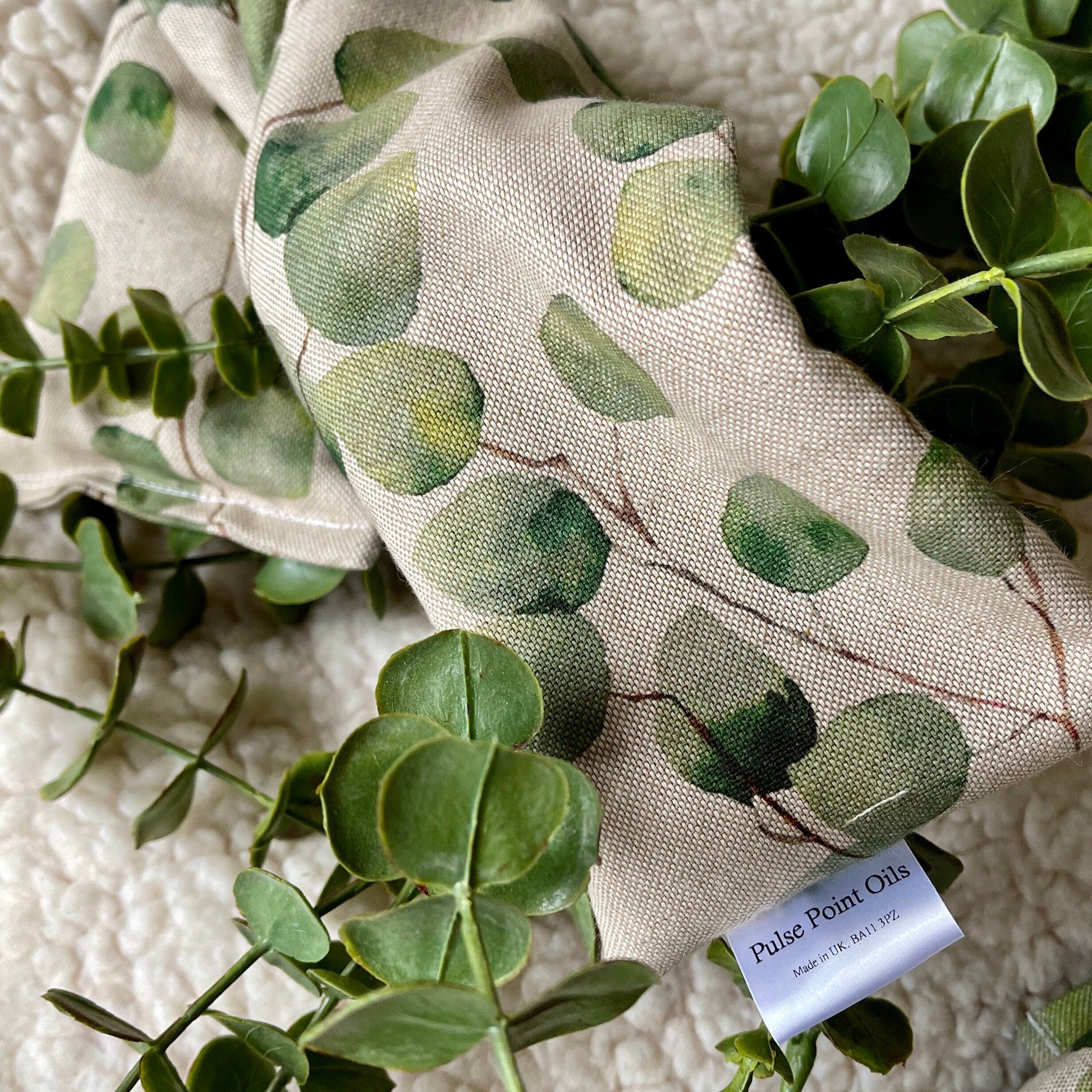 practical wellbeing gift eucalyptus printed cotton wheat bags and eye pillows. Made in the UK with free postage and gift wrap available