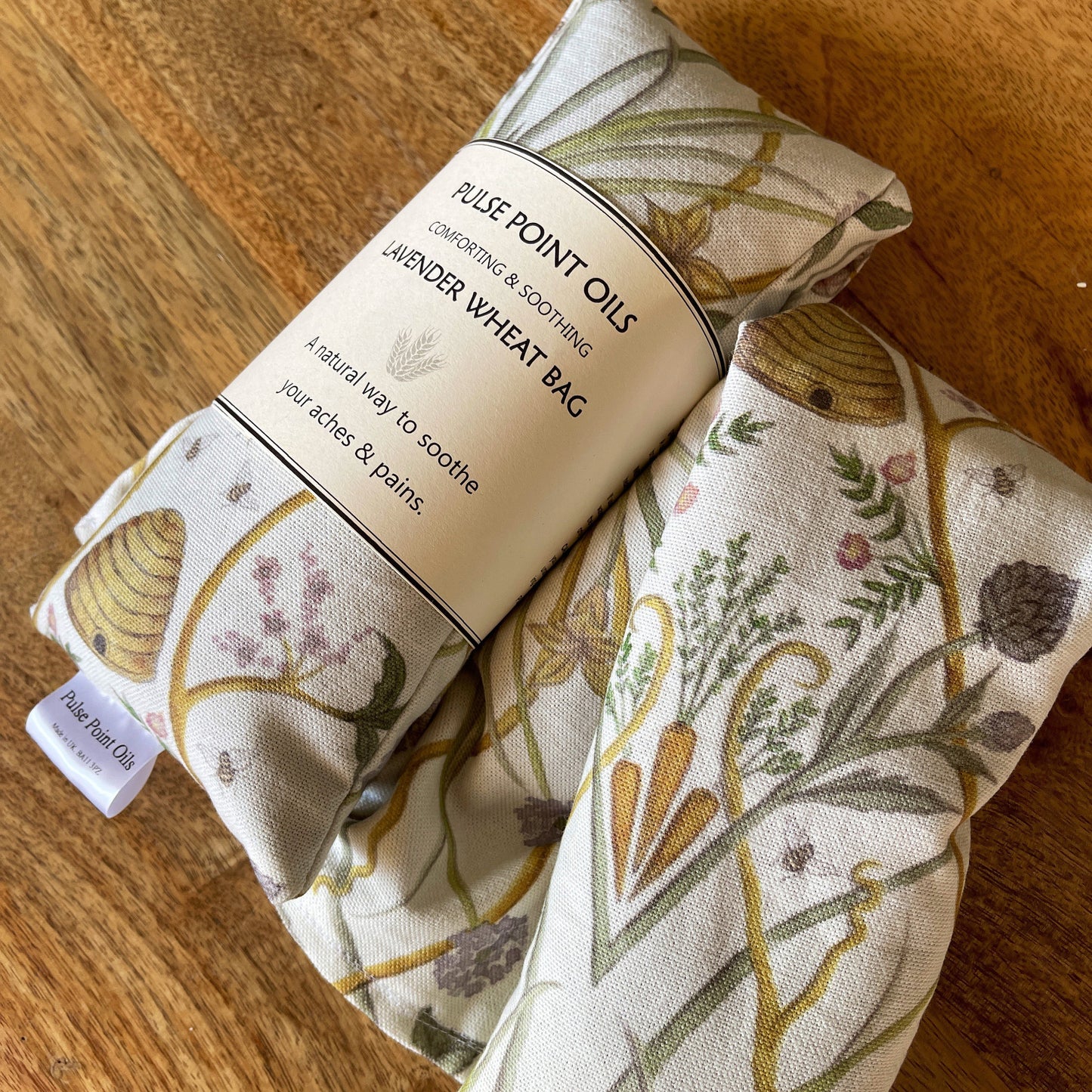 The Château, microwave lavender scented wheat bag, depicting beehives, bees and florals. Best Gardener’s eco friendly gifts