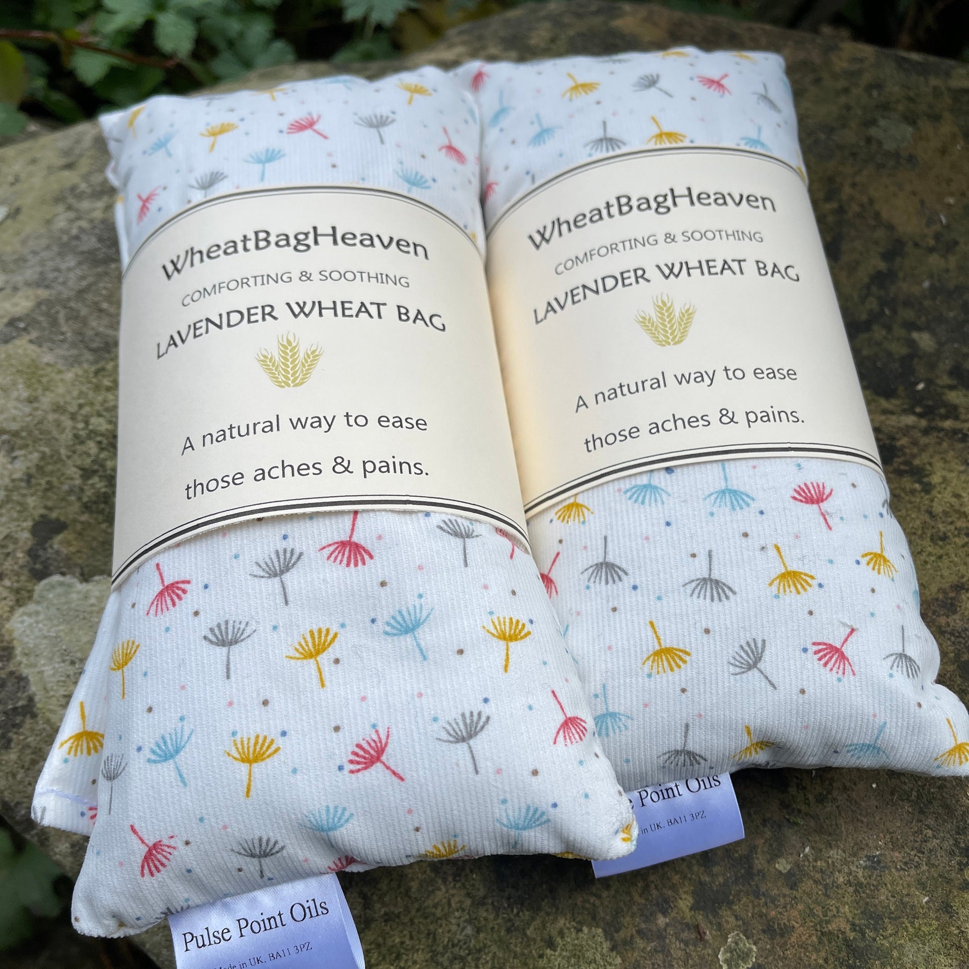 Two light blue printed long cotton wheat bags with lavender. Natural pain relief heat pad.