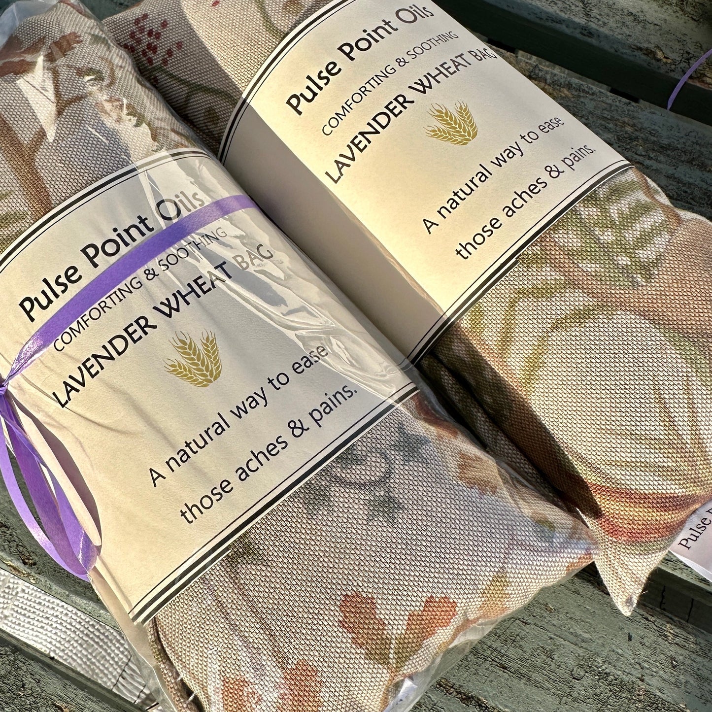 wheat bags for back pain, warming with relaxing lavender. Woodland print heat pad
