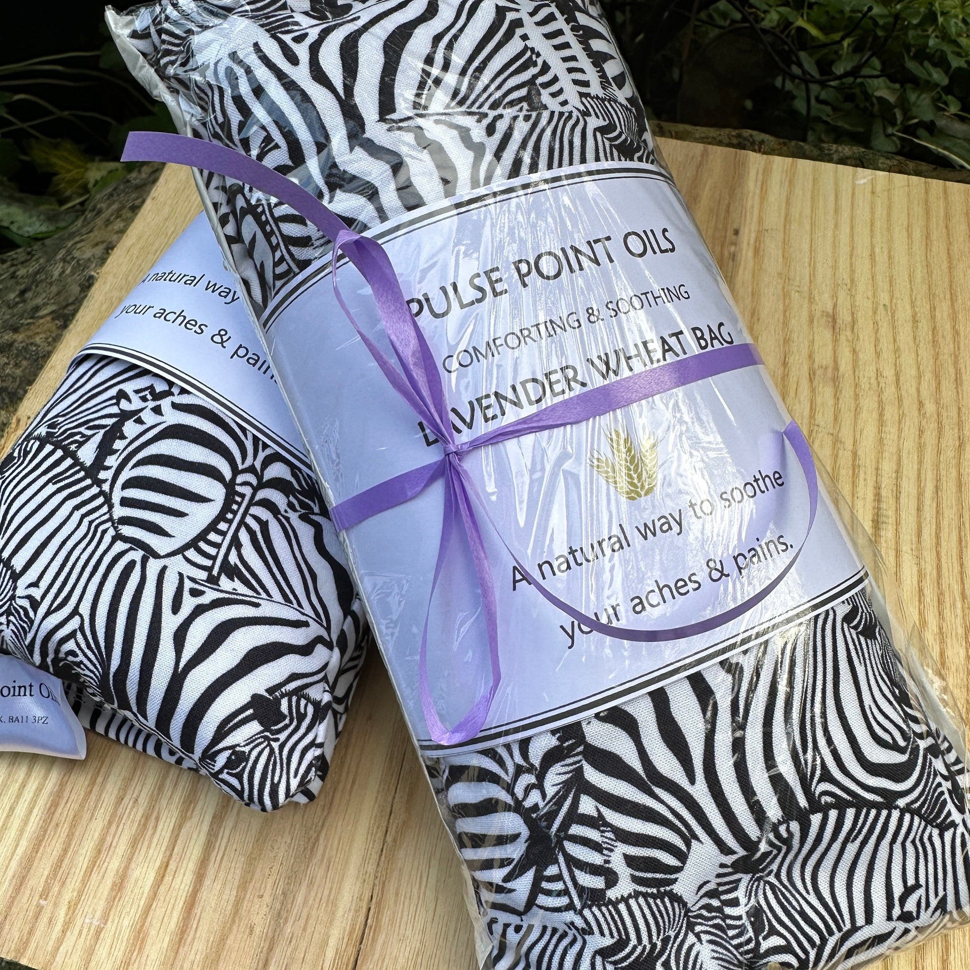 long heat pack for back, shoulder and neck pain in a lovely black and white zebra printed cotton from wheatbagheaven.com