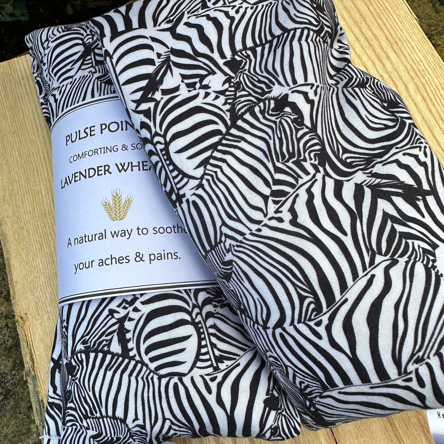 monochrome zebra printed long cotton wheat bags. Re-heatable and reusable heat source for natural pain relief