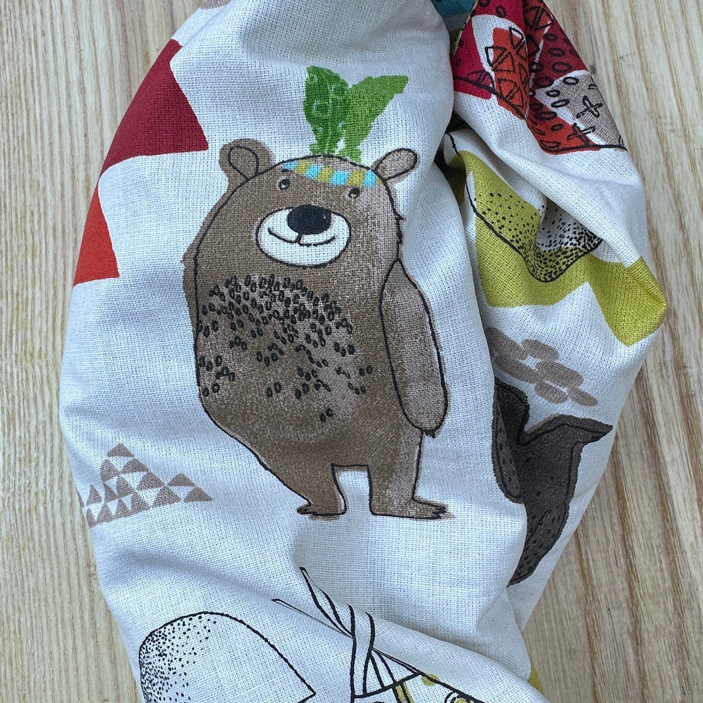children's wheat bag body warmer with Indian bear and tipi print on cotton fabric