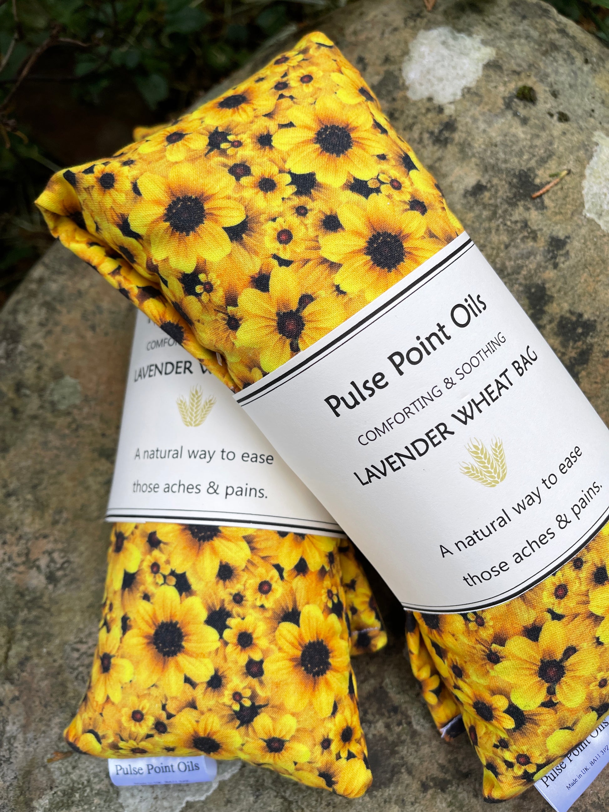 Pair of sunflower printed lavender scented wheat bags handcrafted by WheatBagHeaven. Use for pain relief or comforting relaxation gift