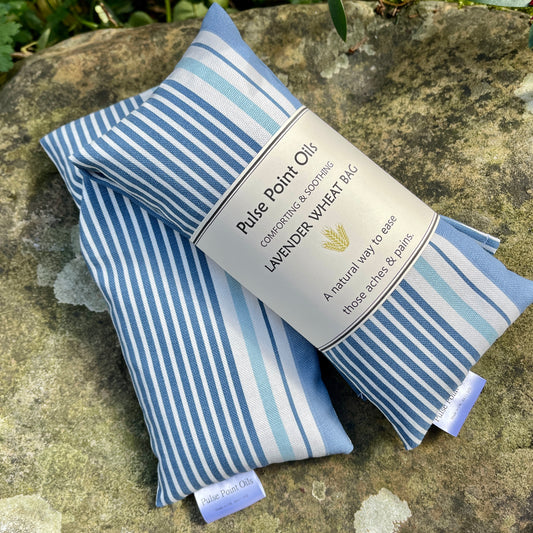 Scented wheat bag, lavender denim blue stripe hottie heating pad, body warmer for wellness and relaxation.