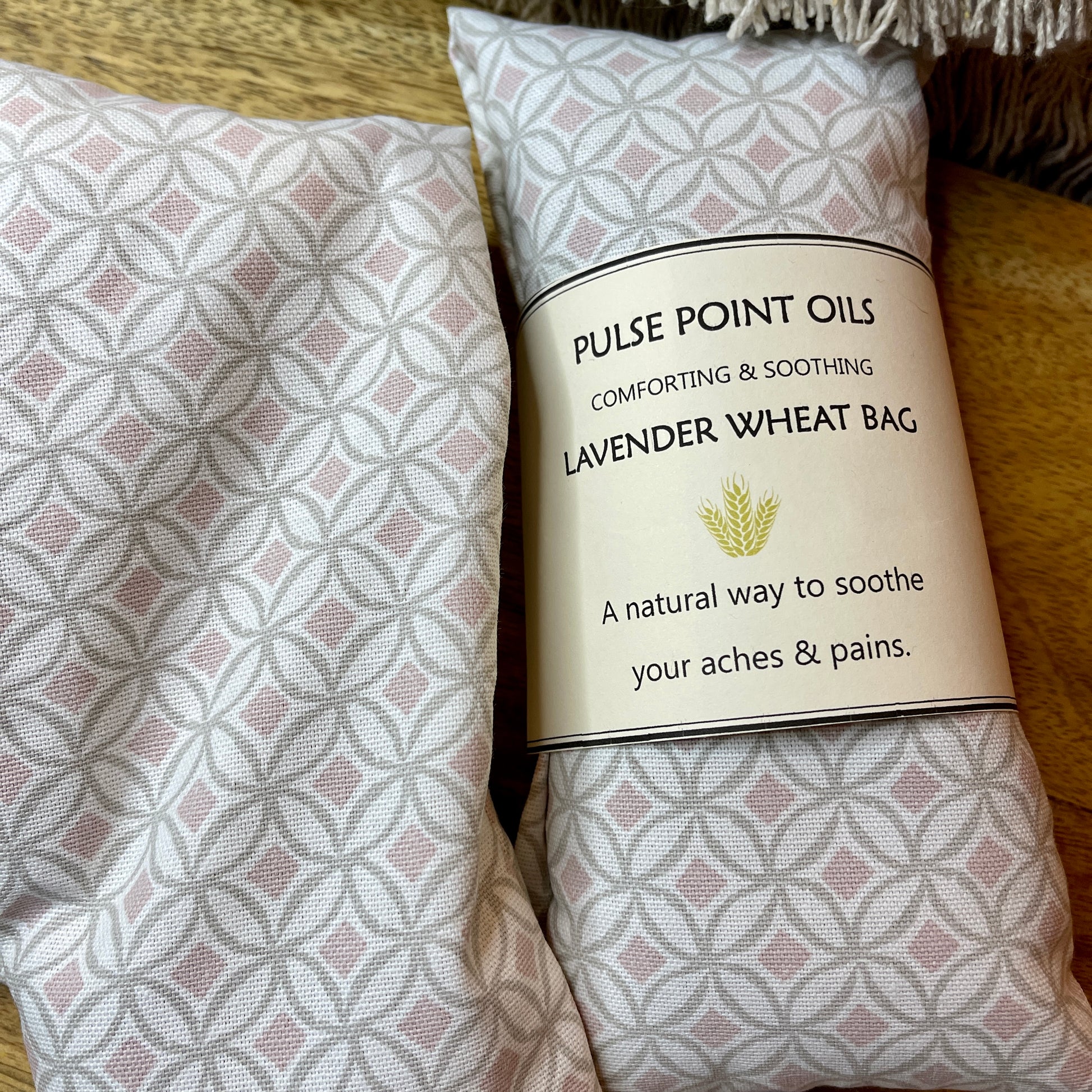 Long aromatherapy heat wrap wheat bag, soft pink and grey print ottis blush, filled with whole wheat and lavender flower